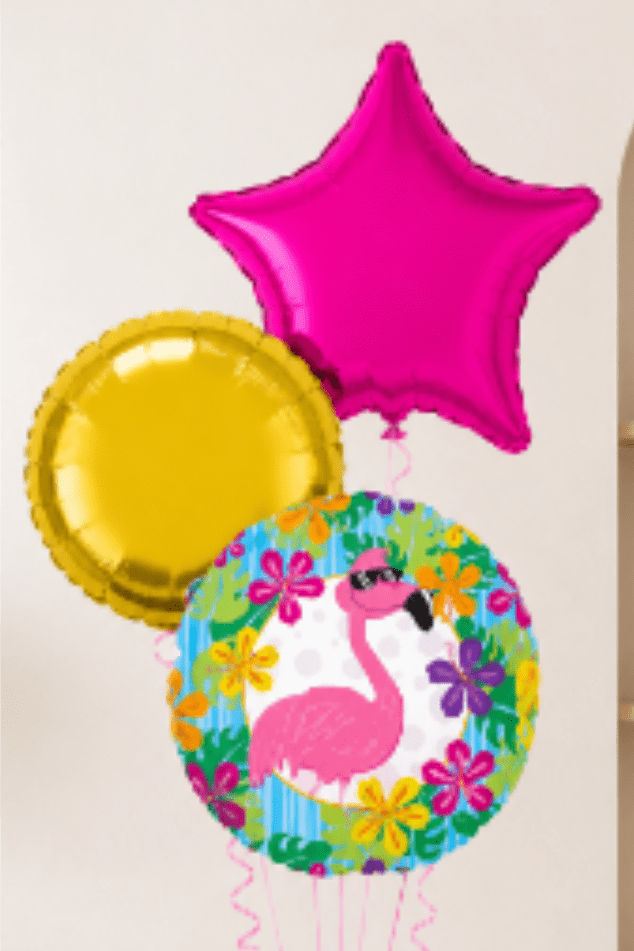 Three colorful balloons, including a pink star and flamingo print balloon