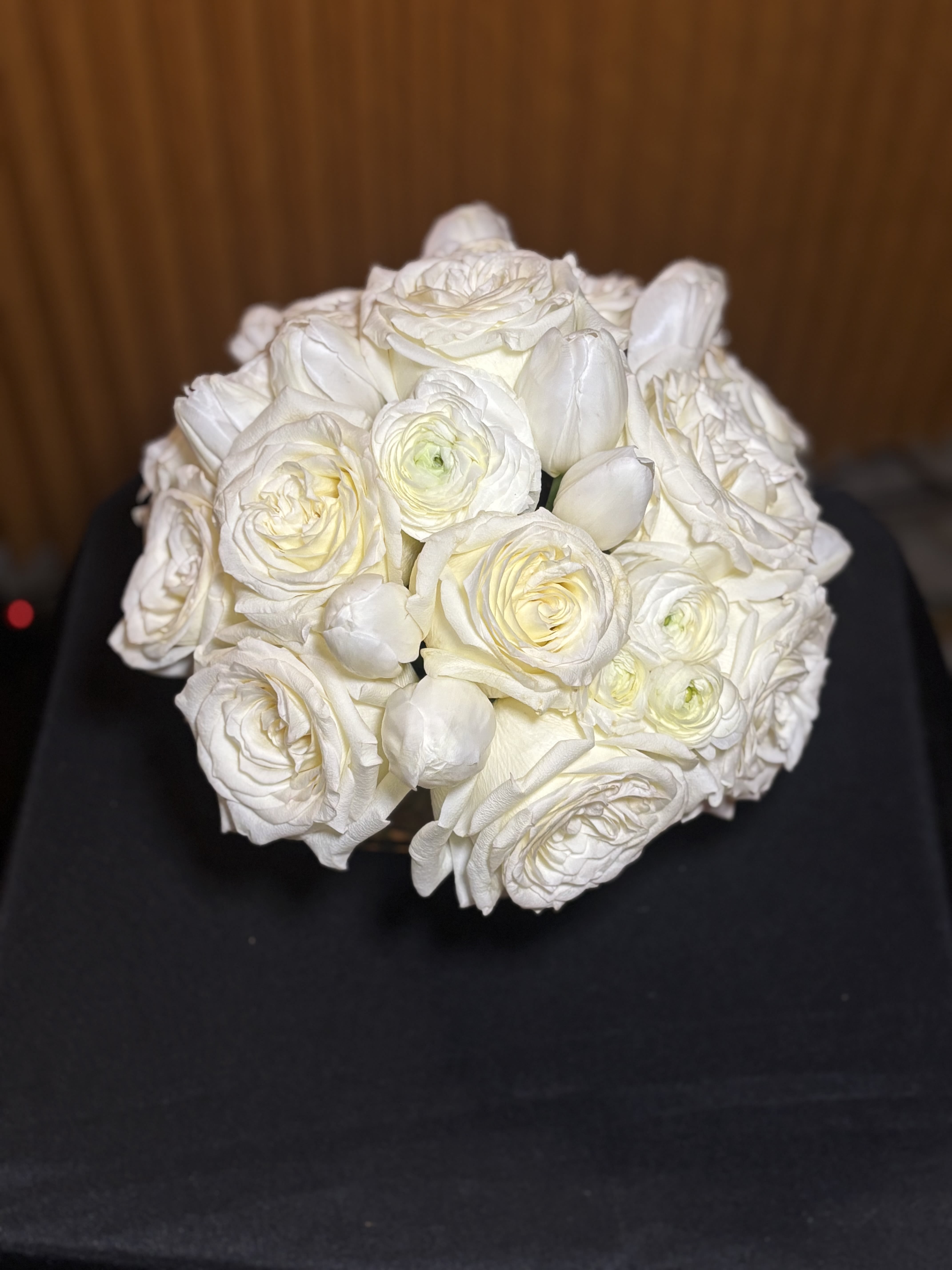 White rose and tulip bouquet with a rounded shape