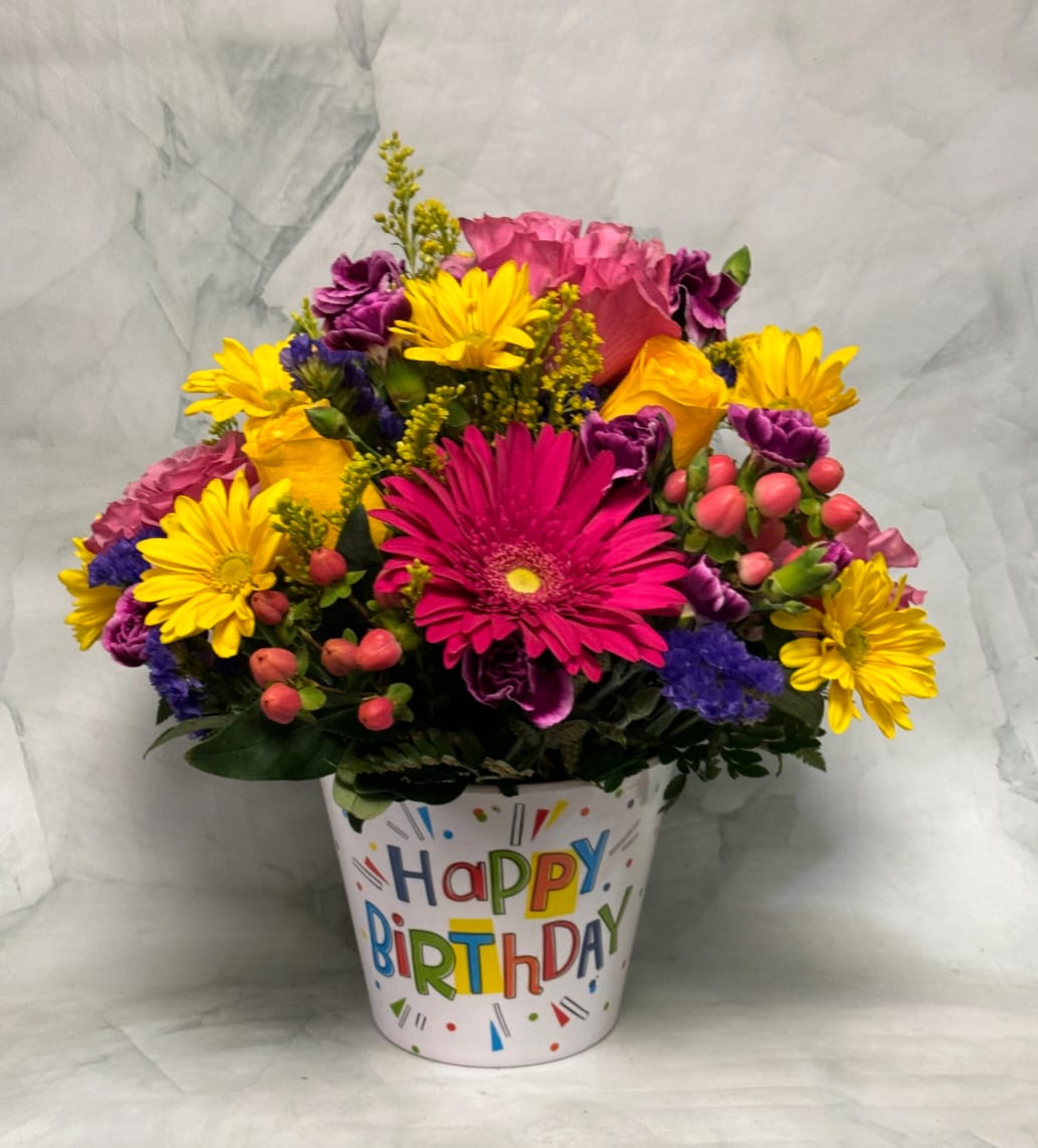 Bright mixed flower bouquet in a birthday pot