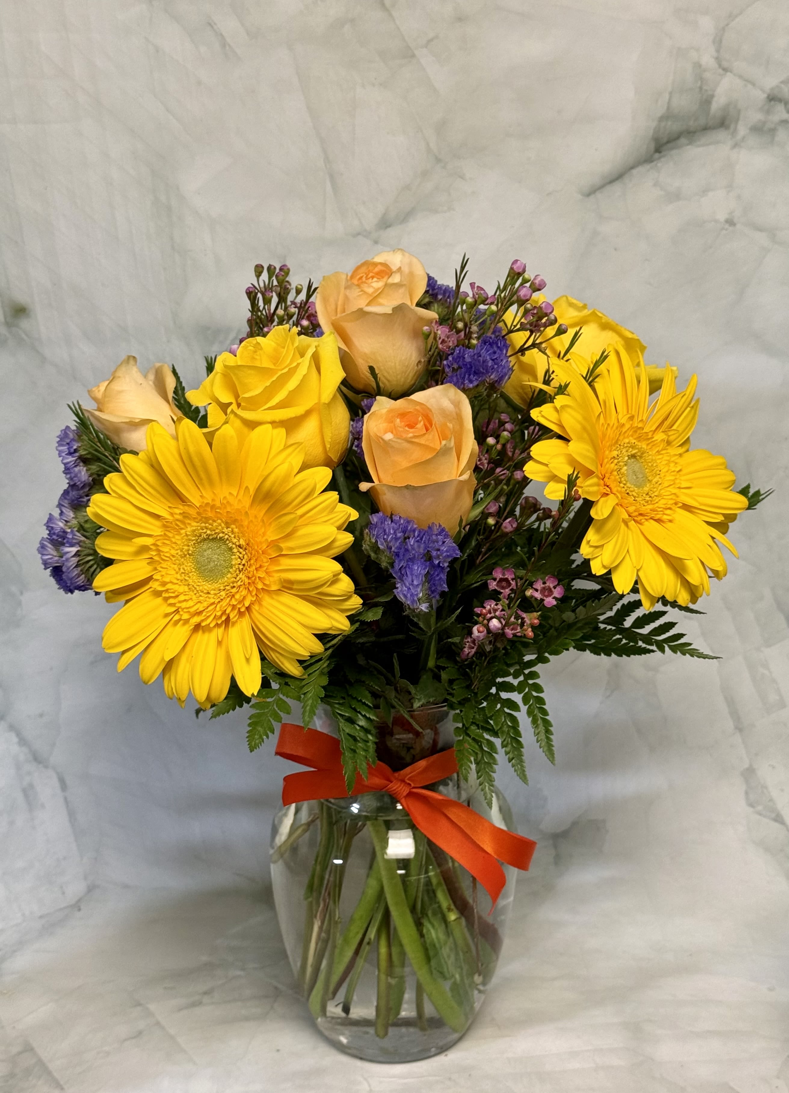Seaside Breeze - Enjoying the seaside is something everyone should do this year. Send this gorgeous floral arrangement to someone you love to let them know you're thinking of them this summer. 