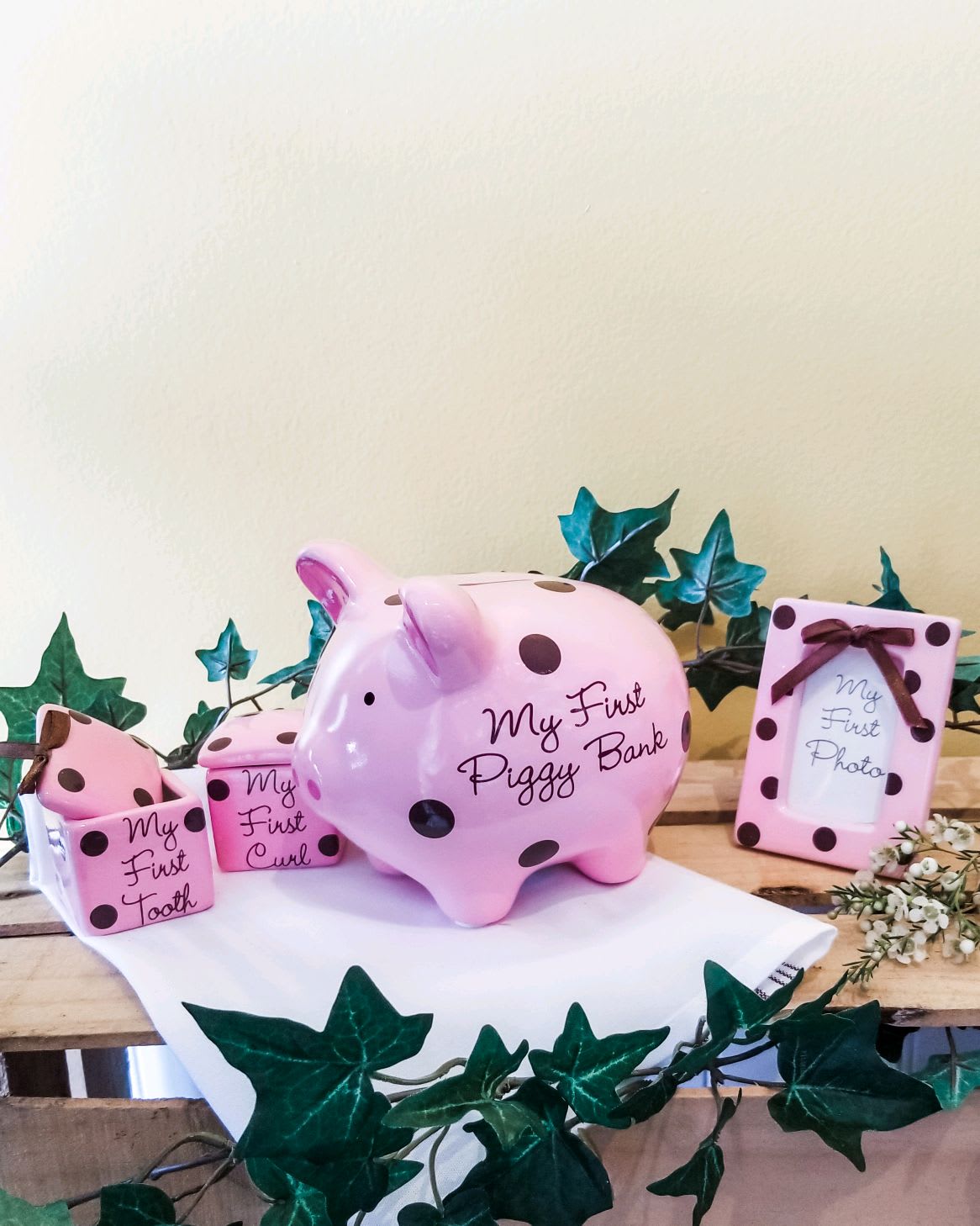 Pink polka-dot baby keepsake set with piggy bank and photo frame