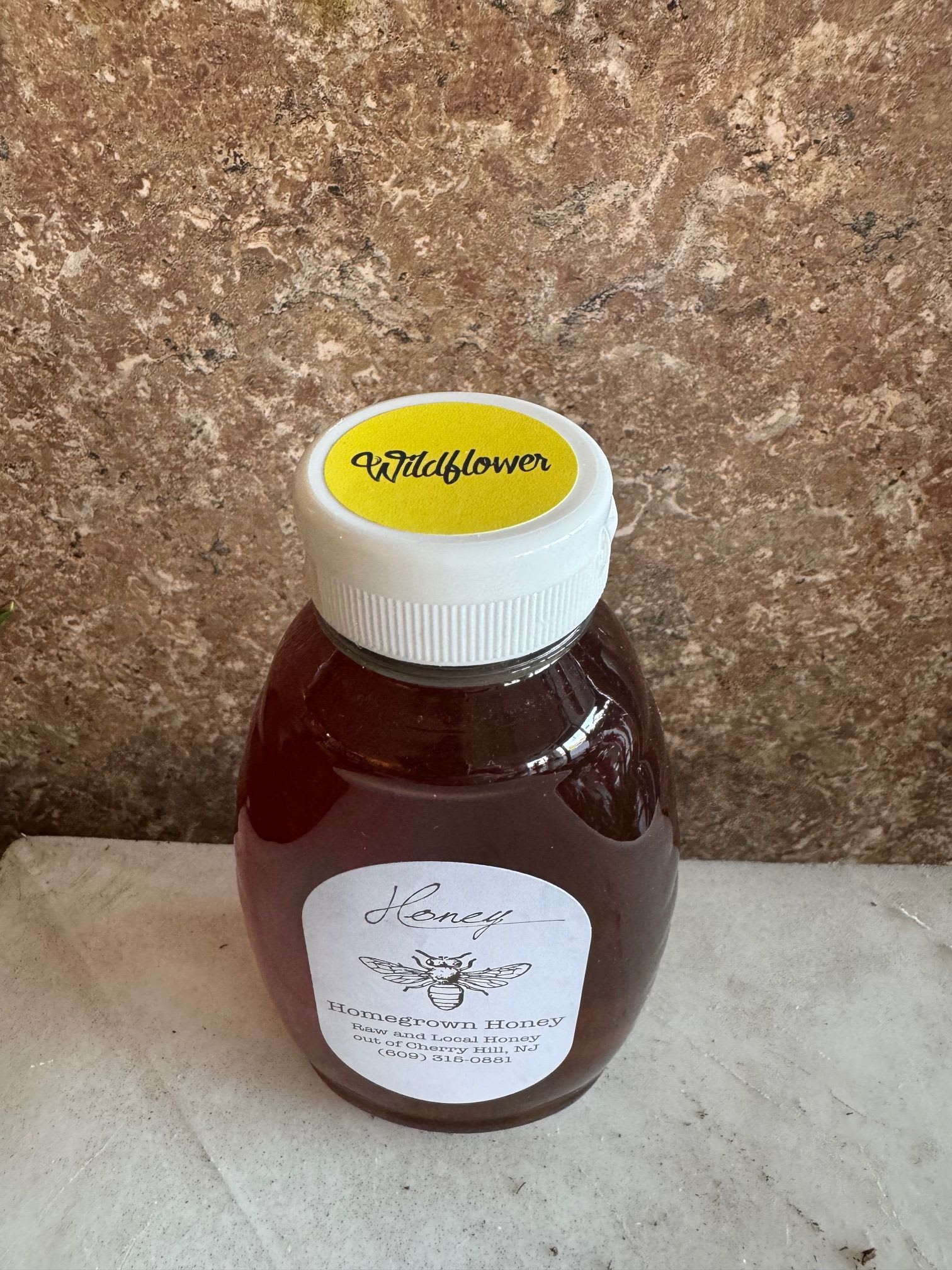 Homegrown Honey- Wildflower - Raw local wildflower honey that is never heated or filtered. From hive to bottle it remains raw and pure with all nutrients, enzymes and pollen- just as the bees intended.  1 pound jar Made right here from our friends in Cherry Hill !  https://njhomegrownhoney.godaddysites.com/