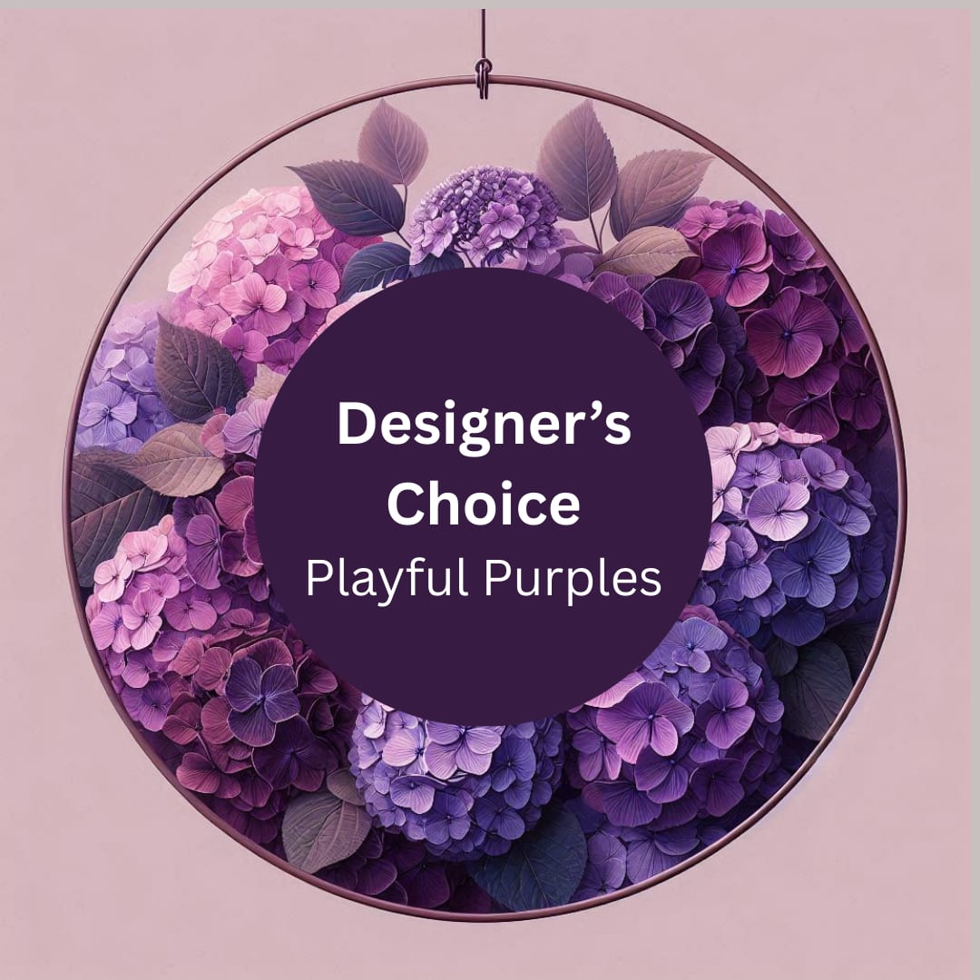 Designer's Choice Playful Purples - Celebrate A special occasion with the Beauty of Blooming Purples. Honor the extraordinary person in your life with our Designer’s Choice Floral Arrangement of Playful Purples. Hand-selected by our expert designers, this stunning bouquet features an enchanting mix of the most exquisite purple blooms—symbolizing grace, admiration, and heartfelt appreciation. Whether you're expressing gratitude, love, or simply brightening their day, this arrangement is sure to captivate and bring joy. 
