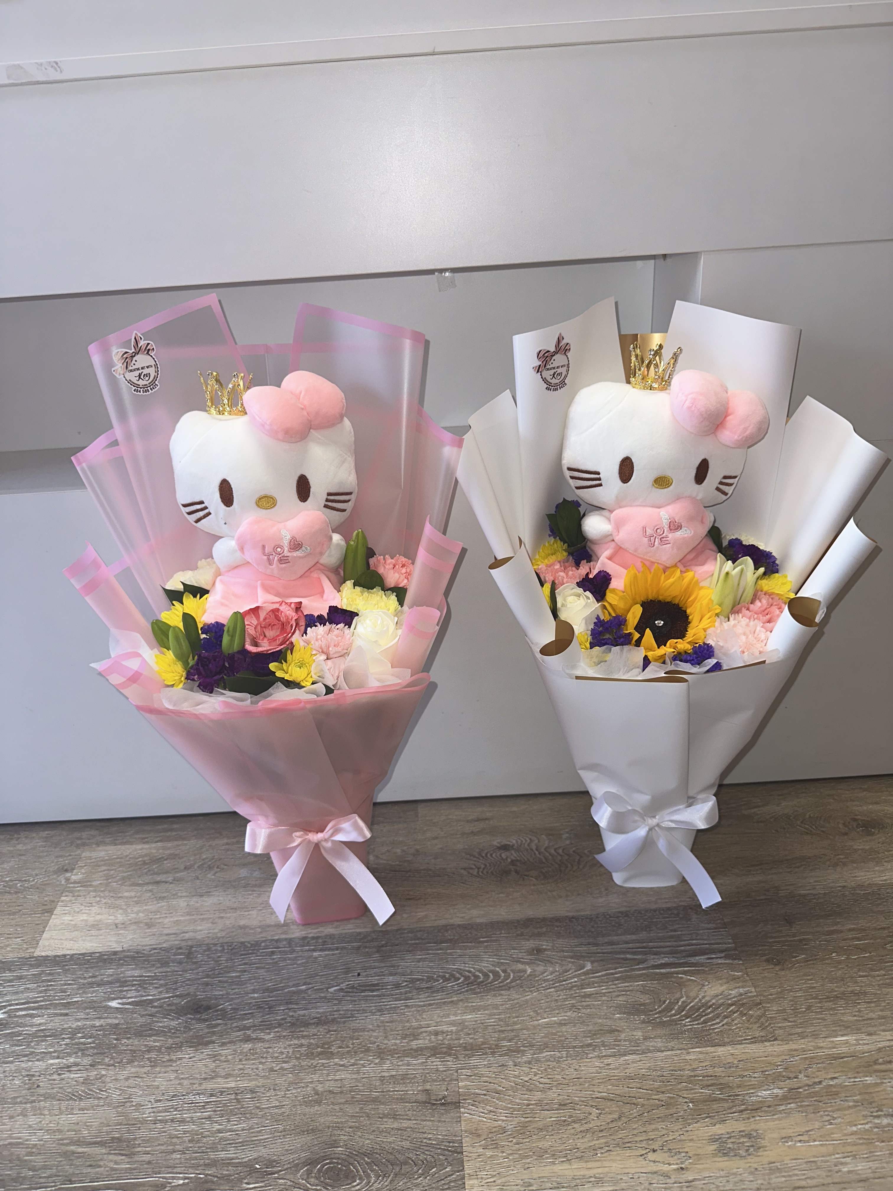 Two bouquet gifts with Hello Kitty plush toys and mixed flowers in pink and white wrap.