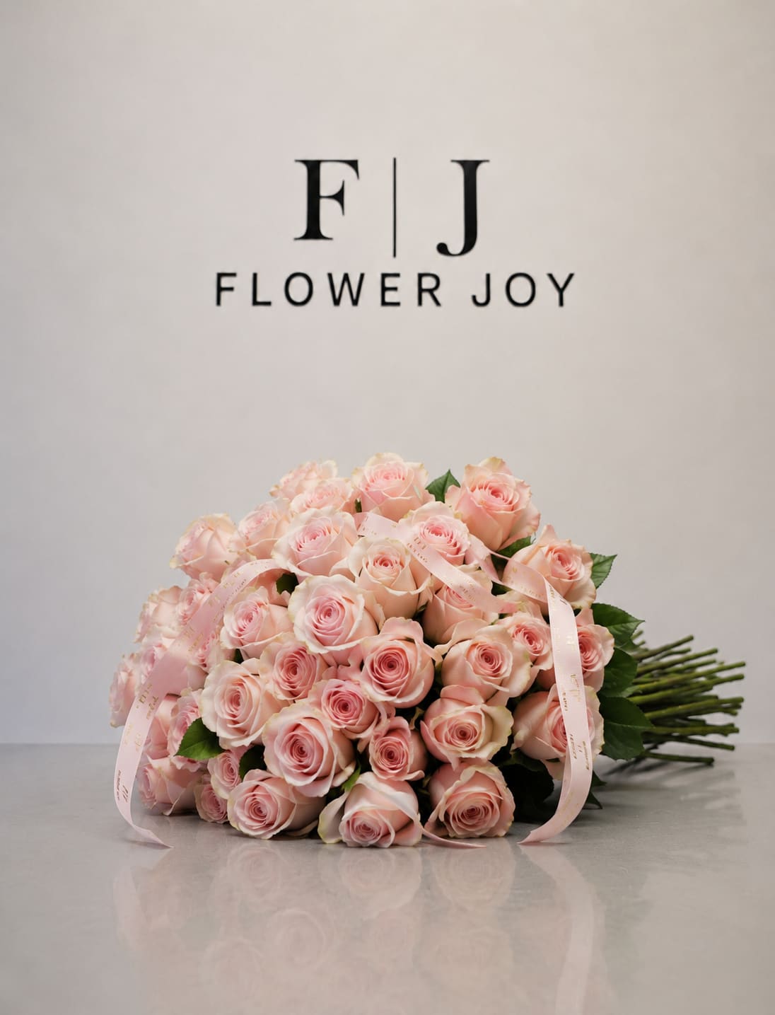 Blush Romance Bouquet - A graceful arrangement of soft blush-pink roses, hand-tied with delicate ribbon details. Elegant, romantic, and timeless—perfect for birthdays, anniversaries, congratulations, or a thoughtful surprise.