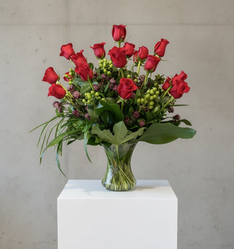 Roses! Two dozen/Red - Bountiful roses with a variety of greens and floral accents.. a generous gift of love.  If you require a different color.. please place request in NOTES or call us to inquire. 24 red roses