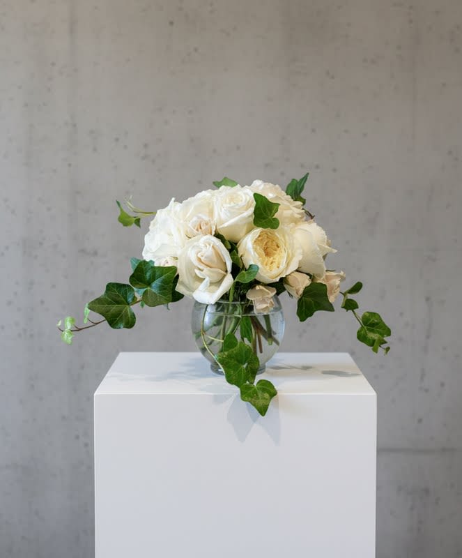 Mimi's Rose Garden - Whites/Creams - Shades of white and cream roses... Inspired by my grandmother's rose garden.. this low and clustered gathering of roses is sure to warm the heart.  10-15 rose blooms of varying color and variety... with a little bit of ivy vine for that fresh from the garden feeling.  Approx 10x10x10