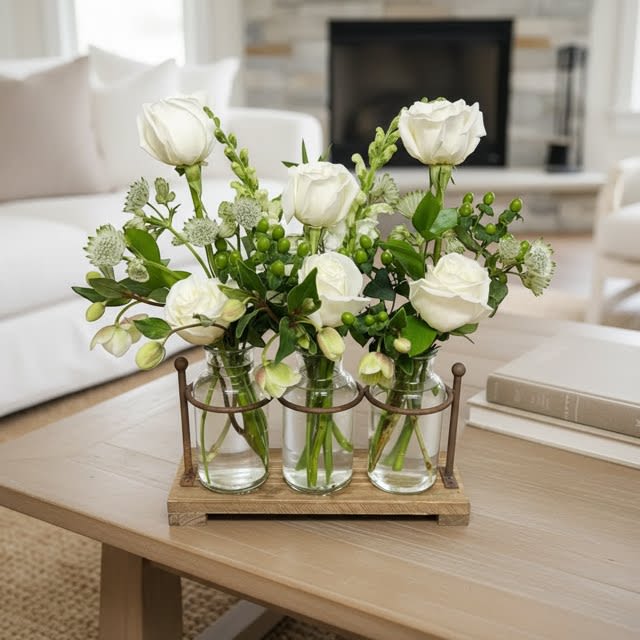 Moonlight Whites Rose Trio  - Wonderful woodsy design in a keepsake trio of apothecary jars in a wood and iron holder.  This creation features a variety of wildflowers, greens, berries and crisp white roses. 