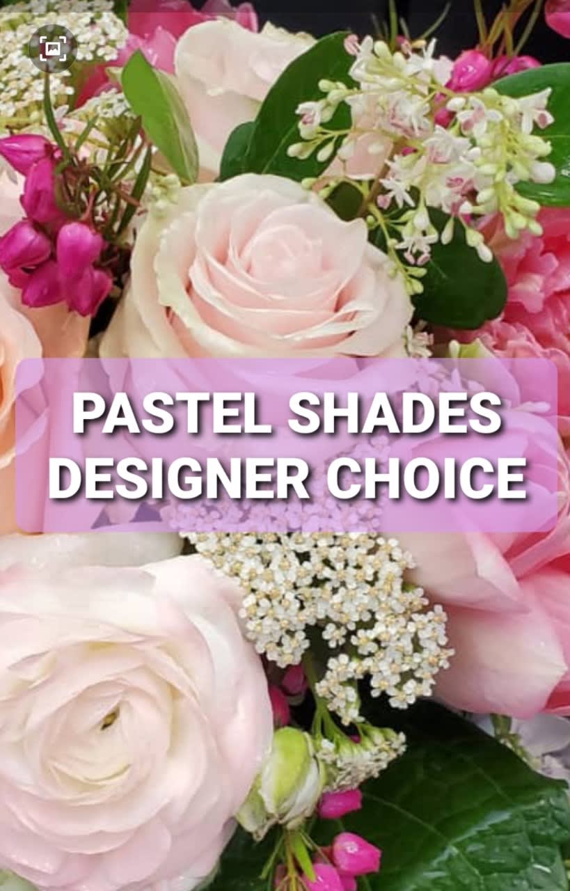 Pastel pink and white roses with small filler flowers