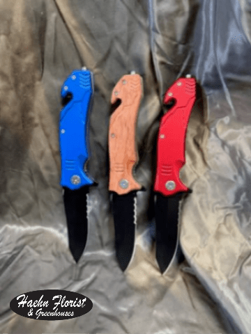  Rescue Knife by Bison River  4 1/2" - This aluminum spring assisted knife with a clip features a stainless steel blade, glass breaker, and seatbelt cutter. It's perfect to keep in your vehicle in case of emergencies. It's a gift or incentive that could save lives. Packaged in a Bison River branded box. This knife is also available in Red, Blue and Wood  handled.