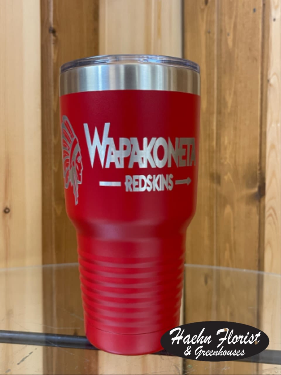 Red insulated tumbler with silver lid and printed logo