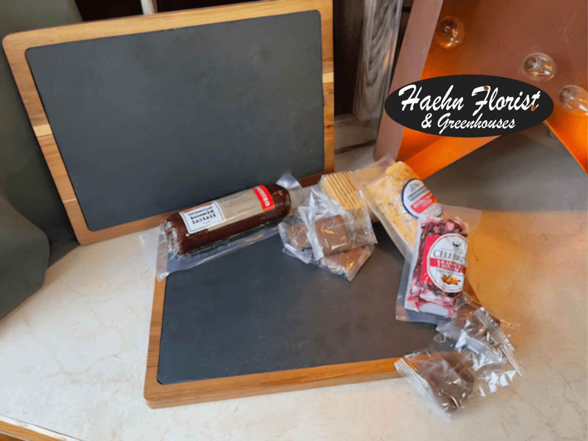 Charcuterie Snack Attack (Engravable Options) - Send a unique gift with an engravable slate and back side is a cutting board topped with select fruit, candies and upgrade for meats and cheeses and drink tumbler