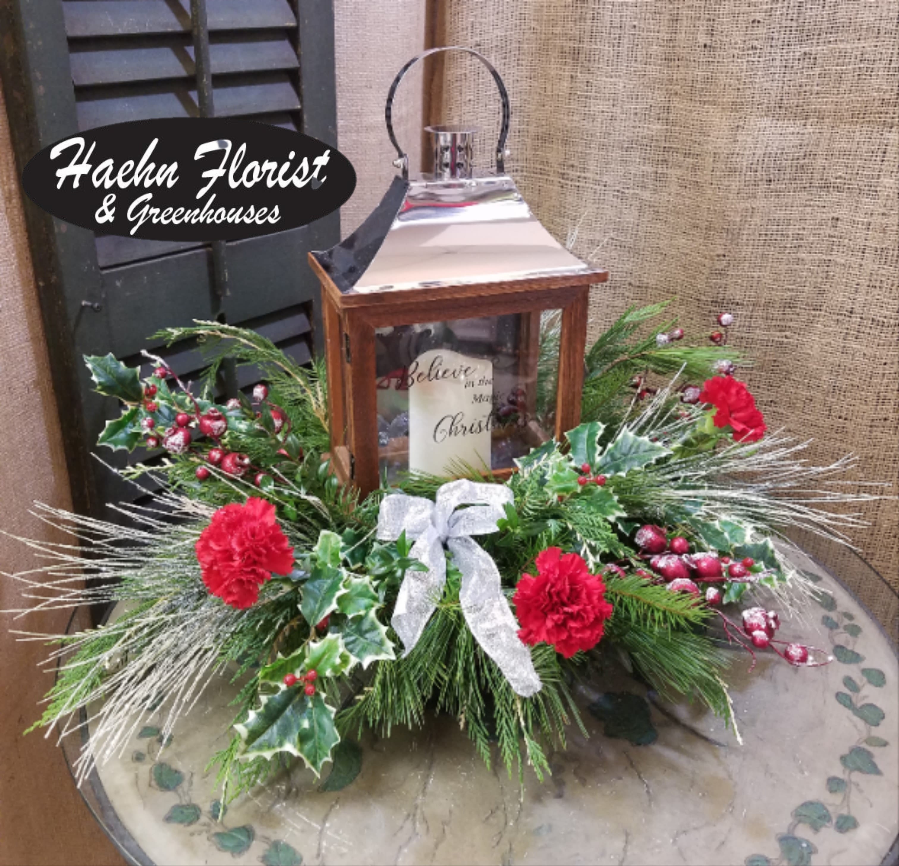 Christmas Lantern Arrangement  - This beautiful arrangement makes a great sentiment for any occasion with a keepsake lantern. Lantern may be a little different than pictured. 