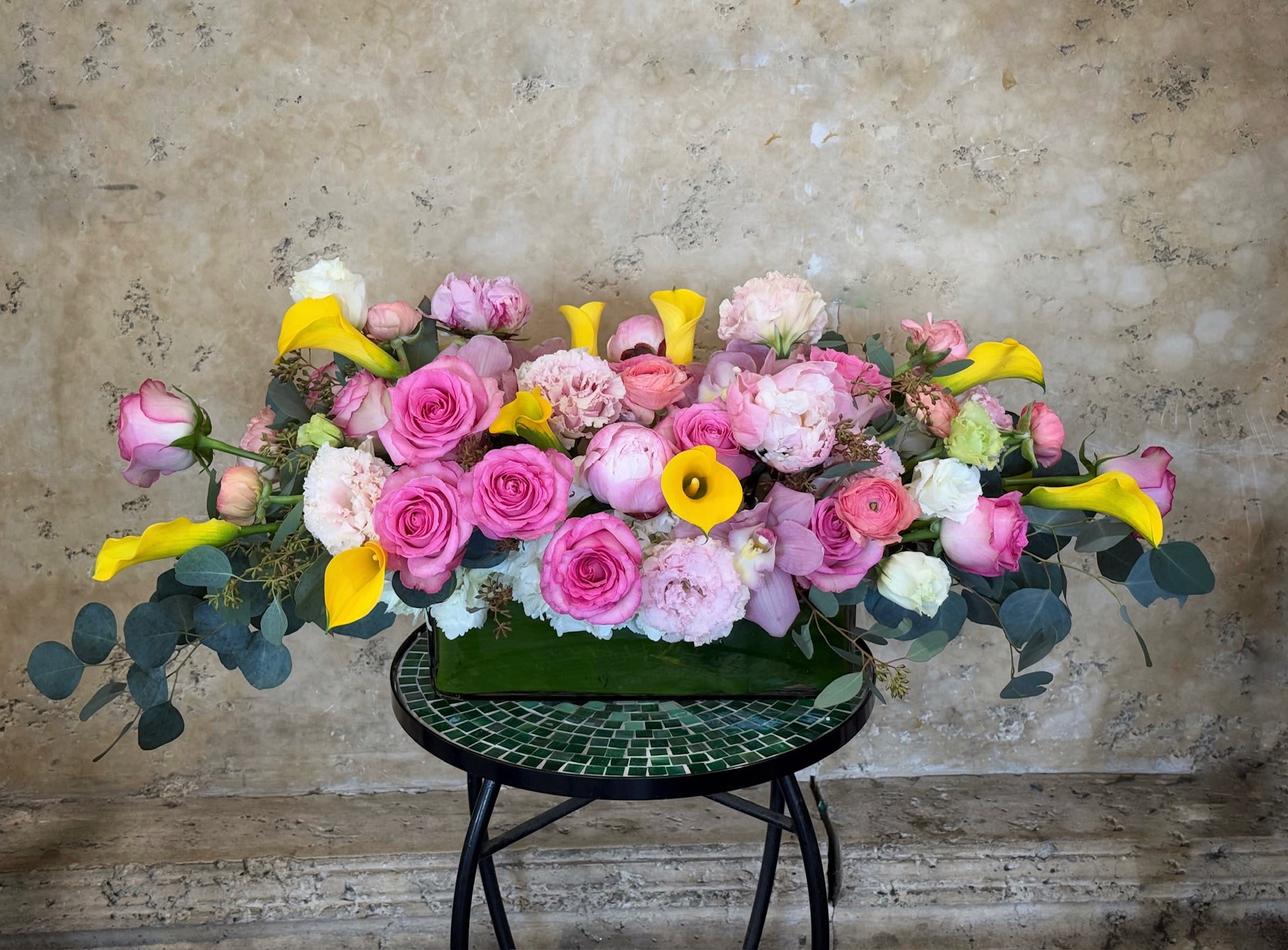 Pasadena  - Premium Roses, Lisianthus, Calla Lilies, Ranunculus, and more in long rectangular vase.