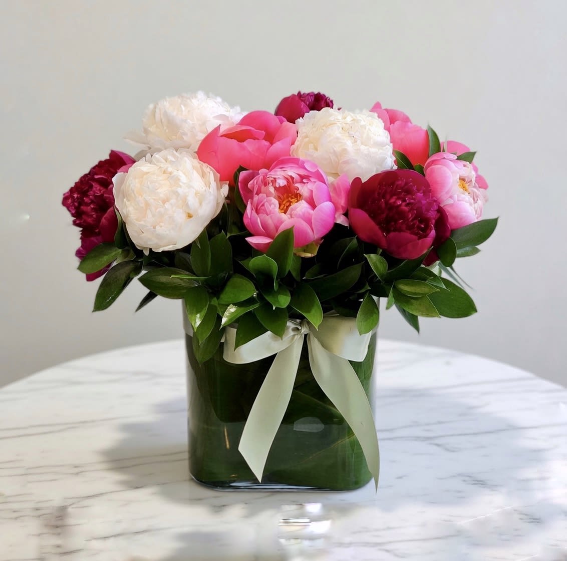 Peonies Bunch - Peonies flowers in glass vase. (Substitution of Colors happen due to seasonality and  availability)