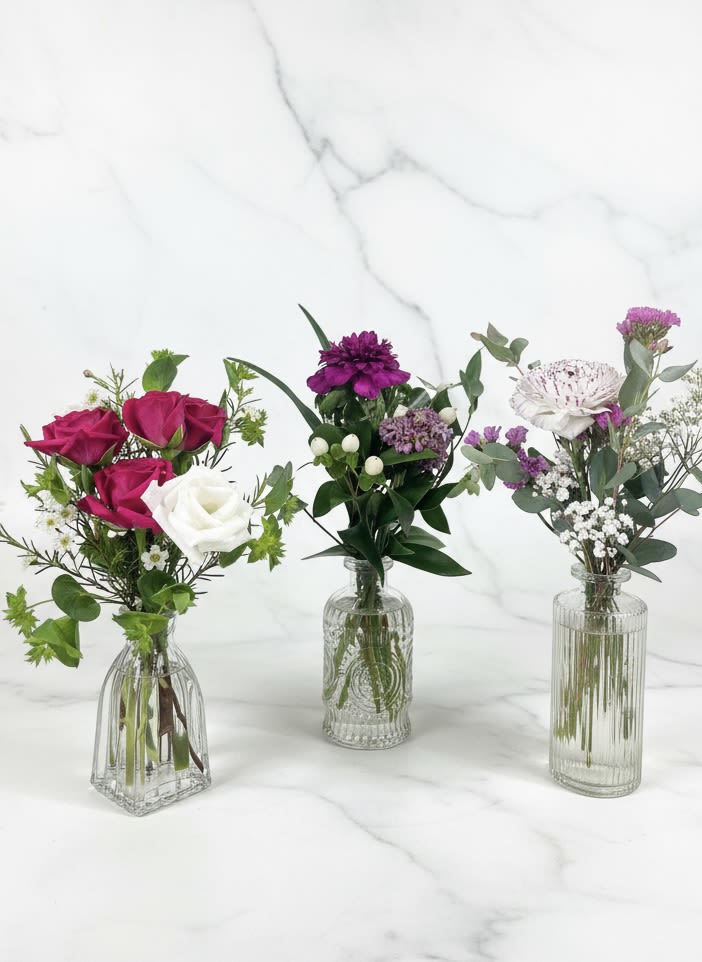 FLIGHT OF MINI VASES - Sprinkle these lovely mini vase collection for your centerpiece and around your home or event.   Standard includes 3 vases  Deluxe includes 6 vases  Premium includes 10 vases   We can customize them to suit your color scheme. Please let us know! 