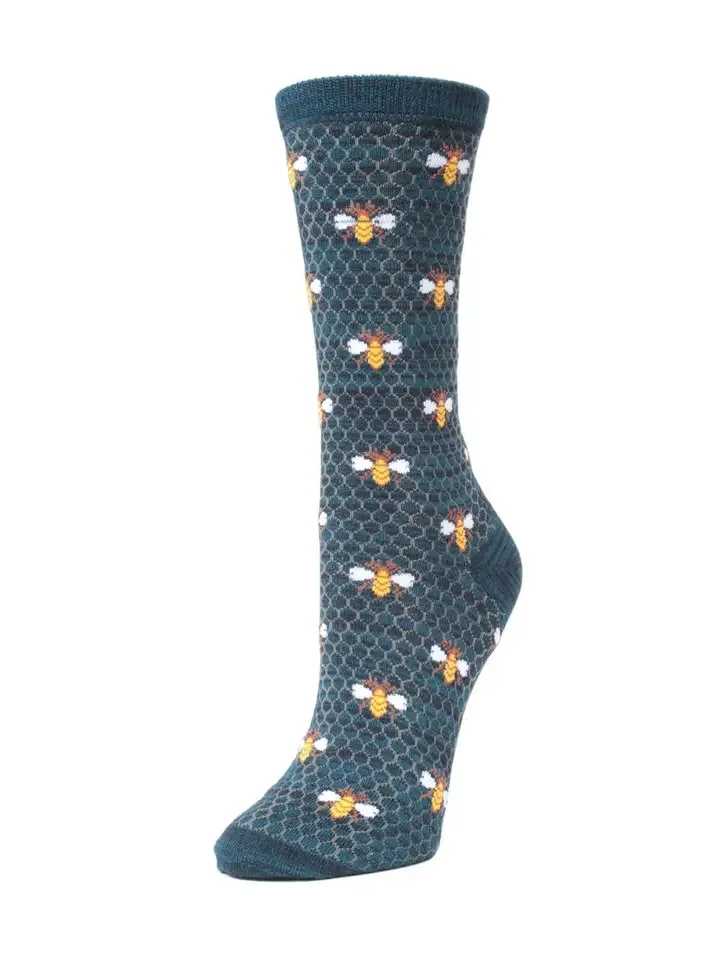Single patterned sock with bee motifs on a dark background