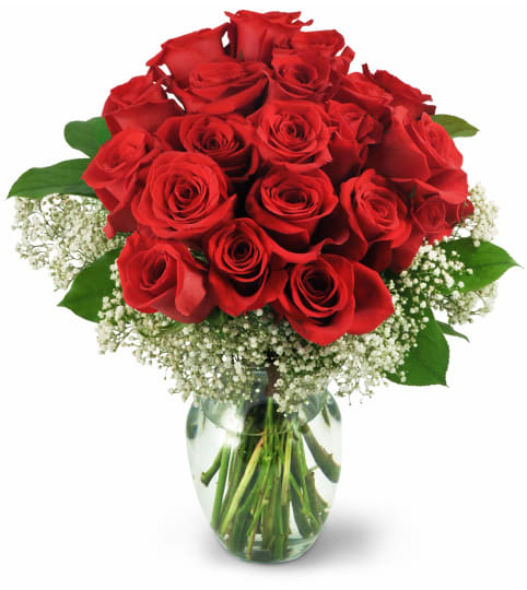 Bouquet of red roses in a clear glass vase