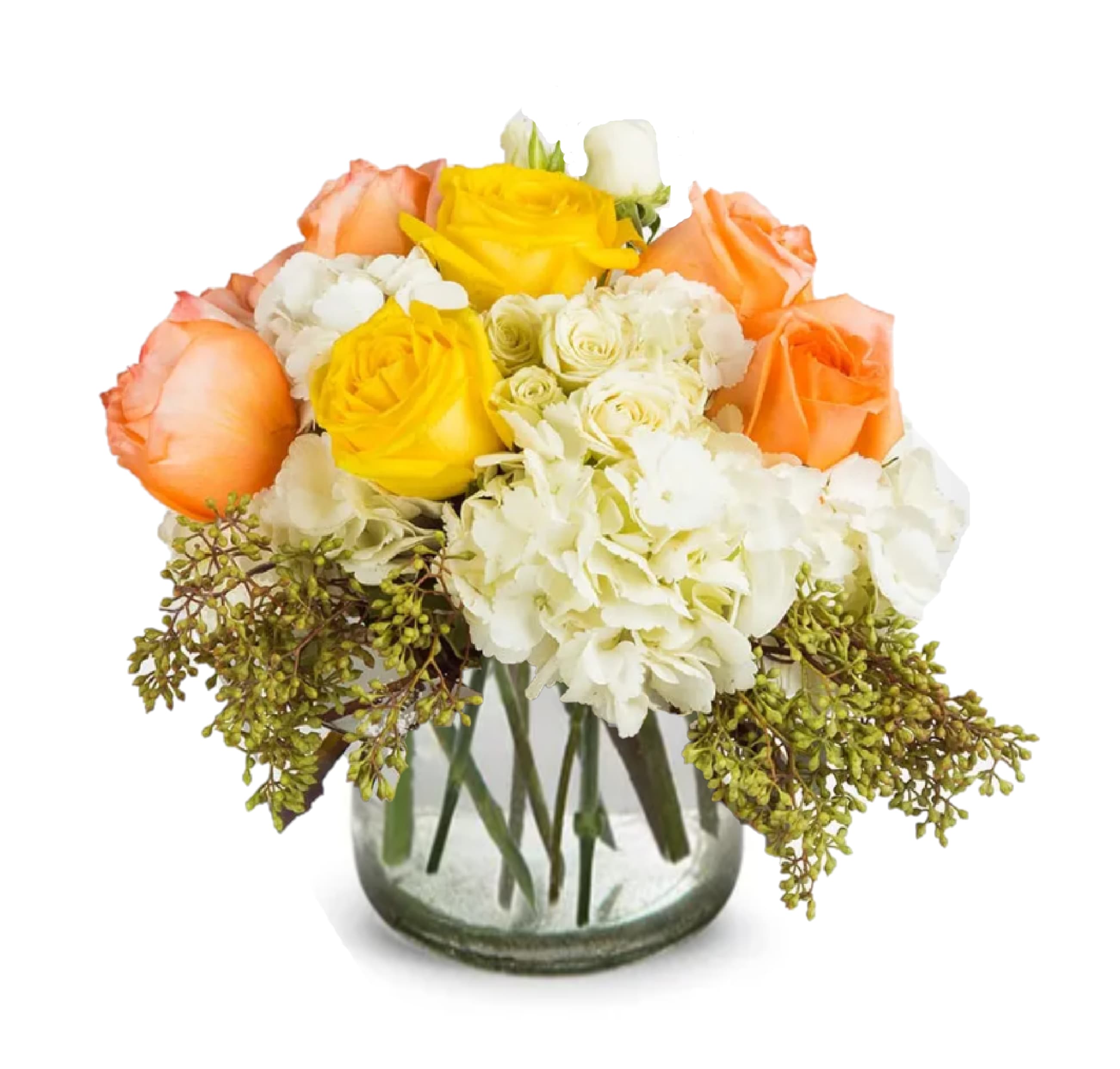 Bouquet of yellow and peach roses with white hydrangeas in a glass vase