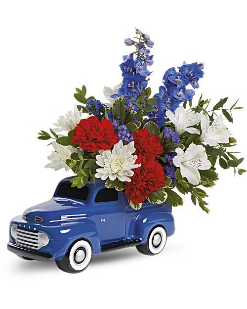 Ford Pickup Bouquet - Beep, beep! Say "Happy Birthday," "Happy Father's Day," or "Keep on Truckin'!" to your favorite car buff with this designers choice whimsical bouquet, arranged in a reusable keepsake that will look great on his desk for years to come. The designer will use the freshest available flowers to create a fun bouquet. **Please specify if you would like a specific color scheme***