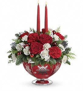 Teleflora's Silver And Joy Centerpiece - Lush red roses, red carnations and white miniature carnations are arranged with lemon leaf, flat cedar and noble fir. Delivered in a Silver And Joy bowl. Approximately 15 W x 17 H