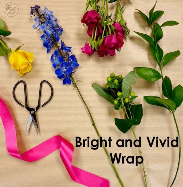 Wrap Bright and Vivid  - A beautiful bouquet of brightly colored wrapped flowers will bring a smile to anyone who receives it.
