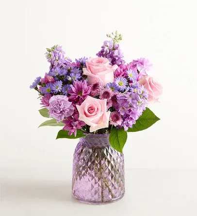 Dreaming of You - Purple vase, pink roses, lavender carnations, lavender daisies, purple monte, lavender stock and greenery 