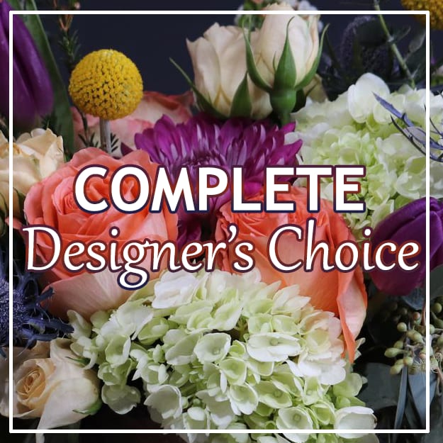 Mixed bouquet with roses, hydrangeas, and purple blooms