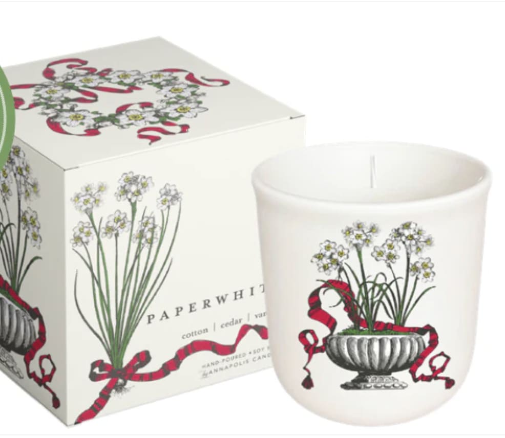 White candle in a frosted glass jar with floral print and matching box