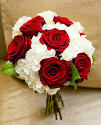 Bouquet of red roses and white hydrangeas