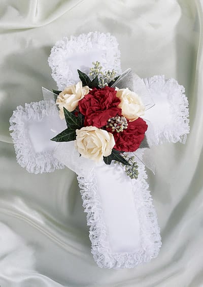 White lace cross with red and cream roses