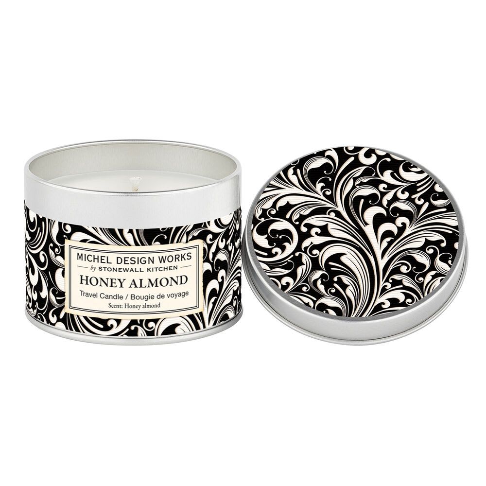 Travel candle in a decorative tin with a matching lid