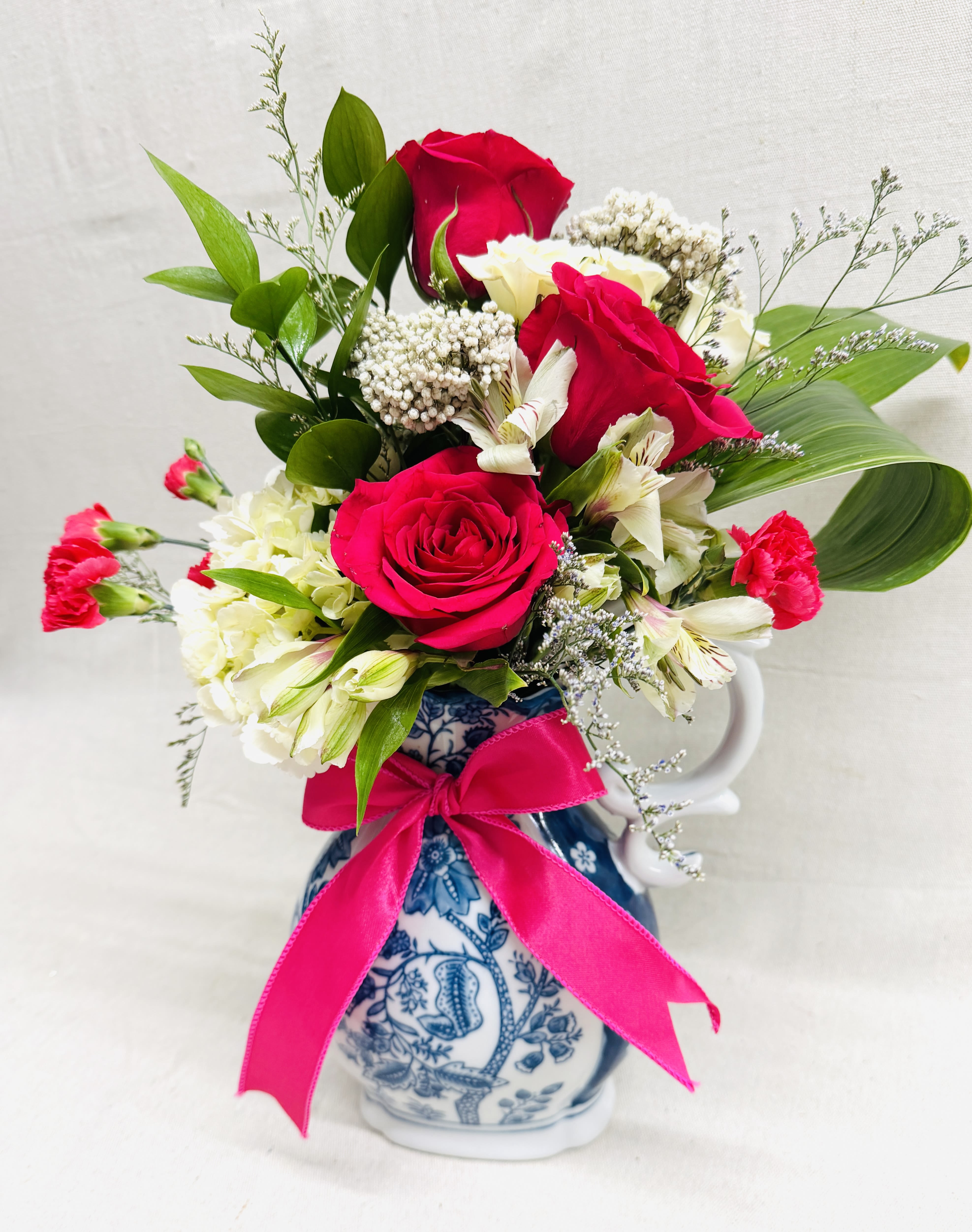 Chinoiserie Pitcher - This Chinoiserie Pitcher comes with the most stunning florals!  When the flowers fade, this pitcher will grace your table for years to come!
