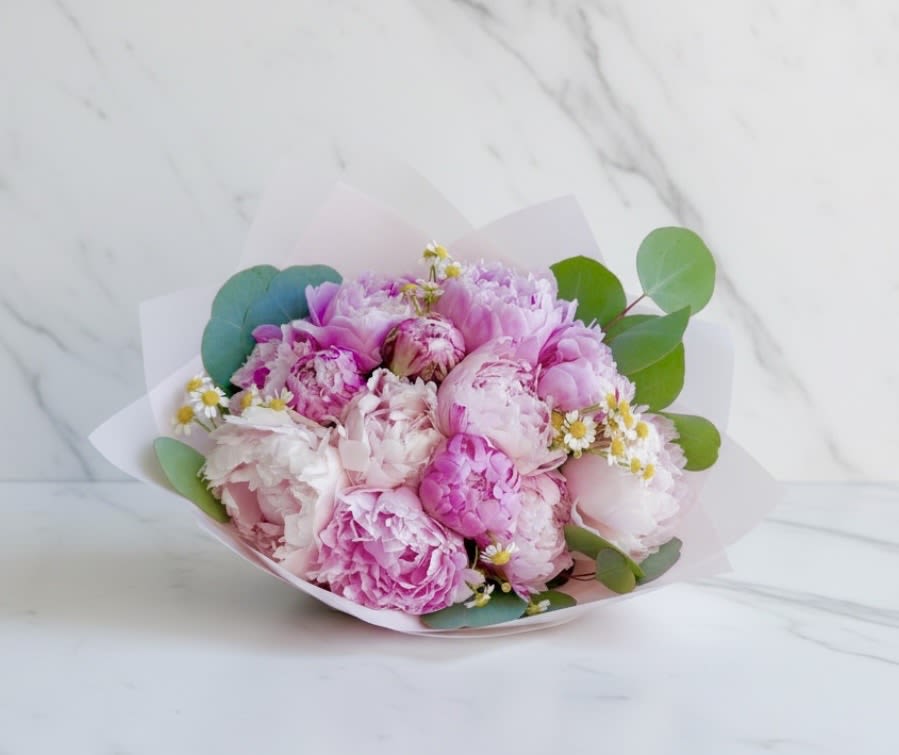 My Beautiful Peony Bouquet  - Peony season is here. Enjoy the beauty of these gorgeous flowers. This beautiful bouquet is crafted with  12 seasonal peonies, ornamental chamomile and fresh greenery. It’s wrapped in solid pink paper and accented with a satin ribbon  Standard size  classic style  It’s perfect for anniversary, birthday, congratulations or just because.    