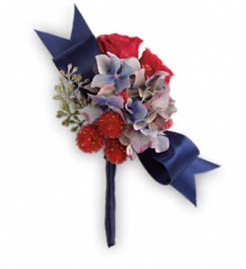 Small bouquet with red and blue flowers tied with a dark ribbon