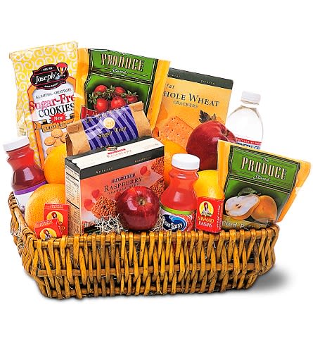 Gift basket with crackers, cookies, fruit, and juice bottles