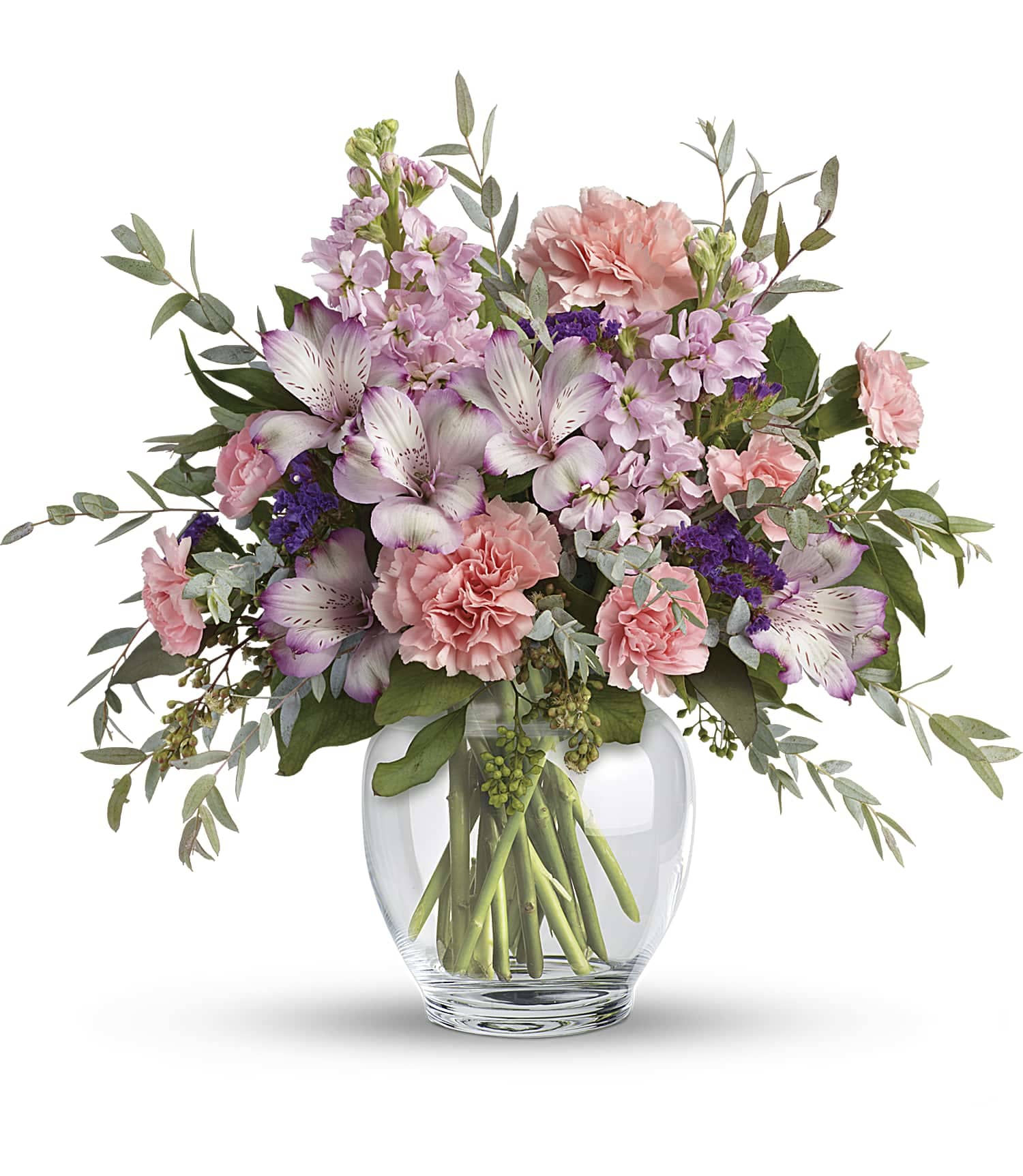 Pink and purple mixed bouquet in a clear glass vase