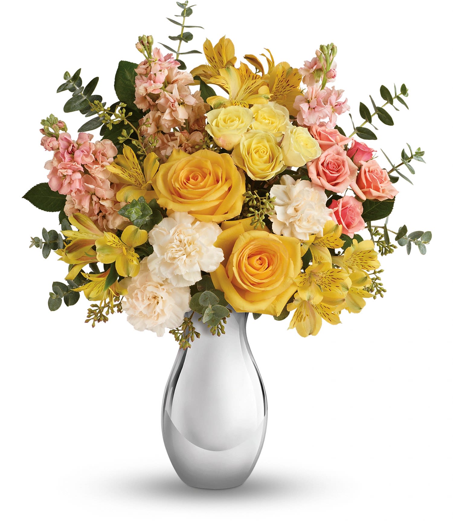 Yellow and pink flower bouquet in a clear glass vase