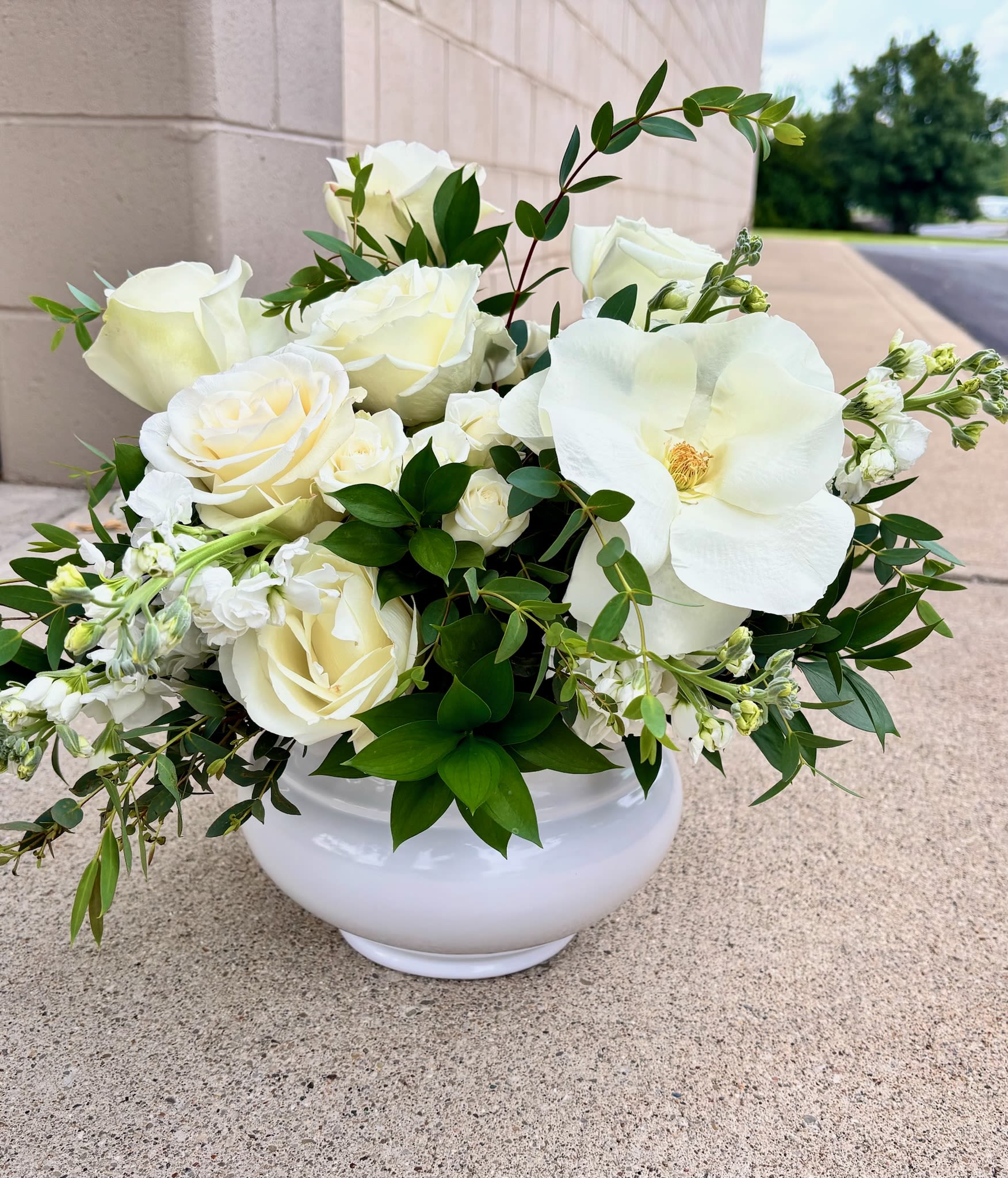 The Noor | Modern and Elegant - The Noor is a timeless arrangement designed in a clean, modern style with an effortless sense of elegance. Thoughtfully composed with seasonal flowers, each arrangement brings a refined, sophisticated touch to birthdays, anniversaries, sympathy, celebrations or simply brightening someone's day.  Every arrangement is thoughtfully created by our floral studio using the freshest flowers available. Your arrangement will be inspired by the overall style, size and design shown. Exact flower varieties and colors will vary based on seasonal and market availability while preserving the beauty, value and character of the arrangement.  To keep your flowers looking their best, refresh the water every 2–3 days and keep the arrangement away from direct heat, sunlight and drafts.  A Ray of Sunshine Floral proudly delivers flowers throughout Hilliard, Dublin, Upper Arlington, Grandview Heights and surrounding Columbus communities.