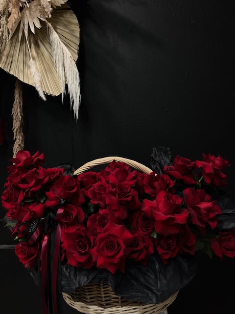 XXL Huge Love in the basket - A huge brown basket with beautiful large, inverted roses with long ribbons to add elegance to the bouquet!