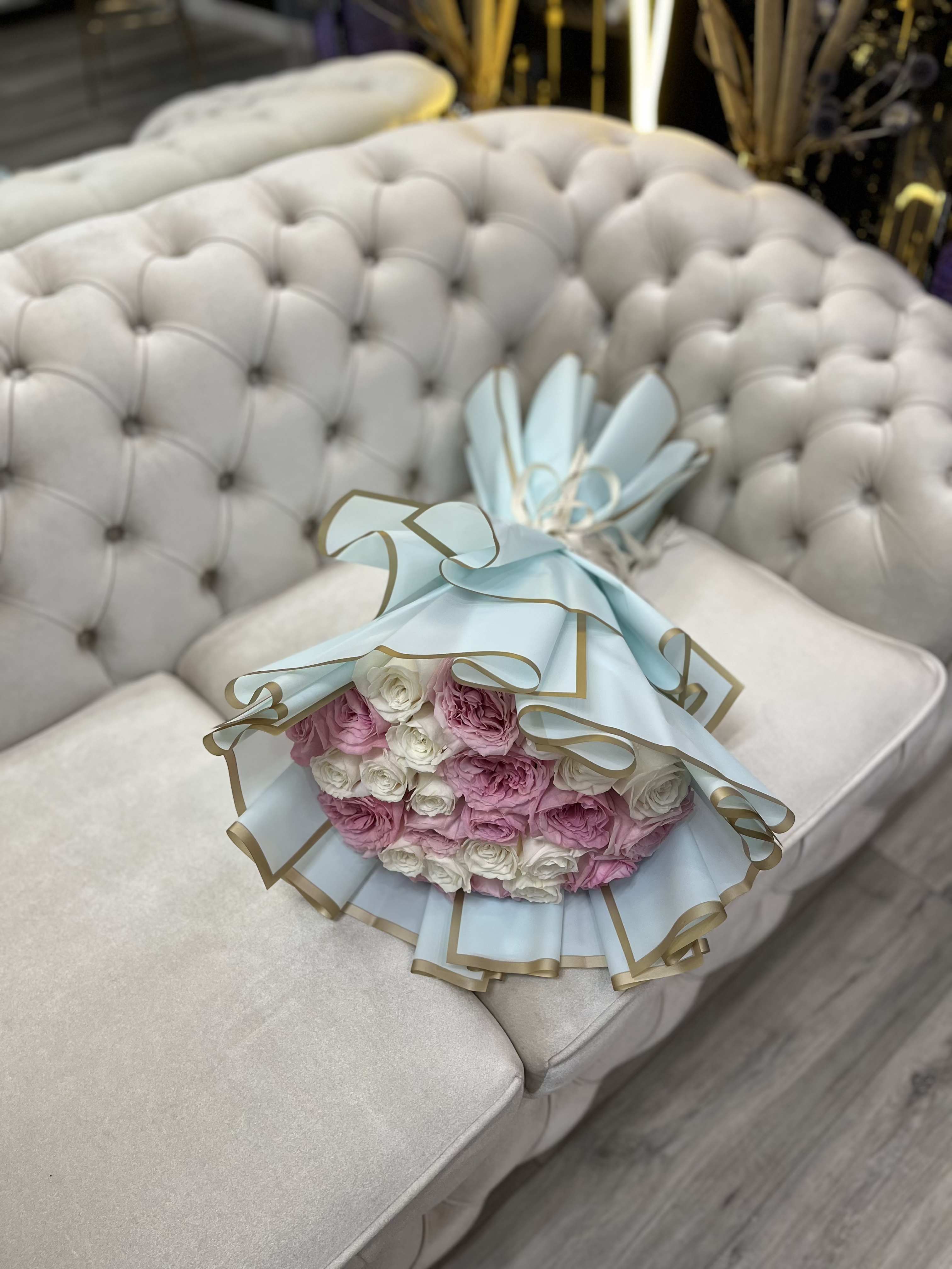 Whispers in White and Pink - A delicate bouquet of 25 white and blush roses, symbolizing purity, love, and harmonious balance. Perfect for celebrating life’s most beautiful moments. 