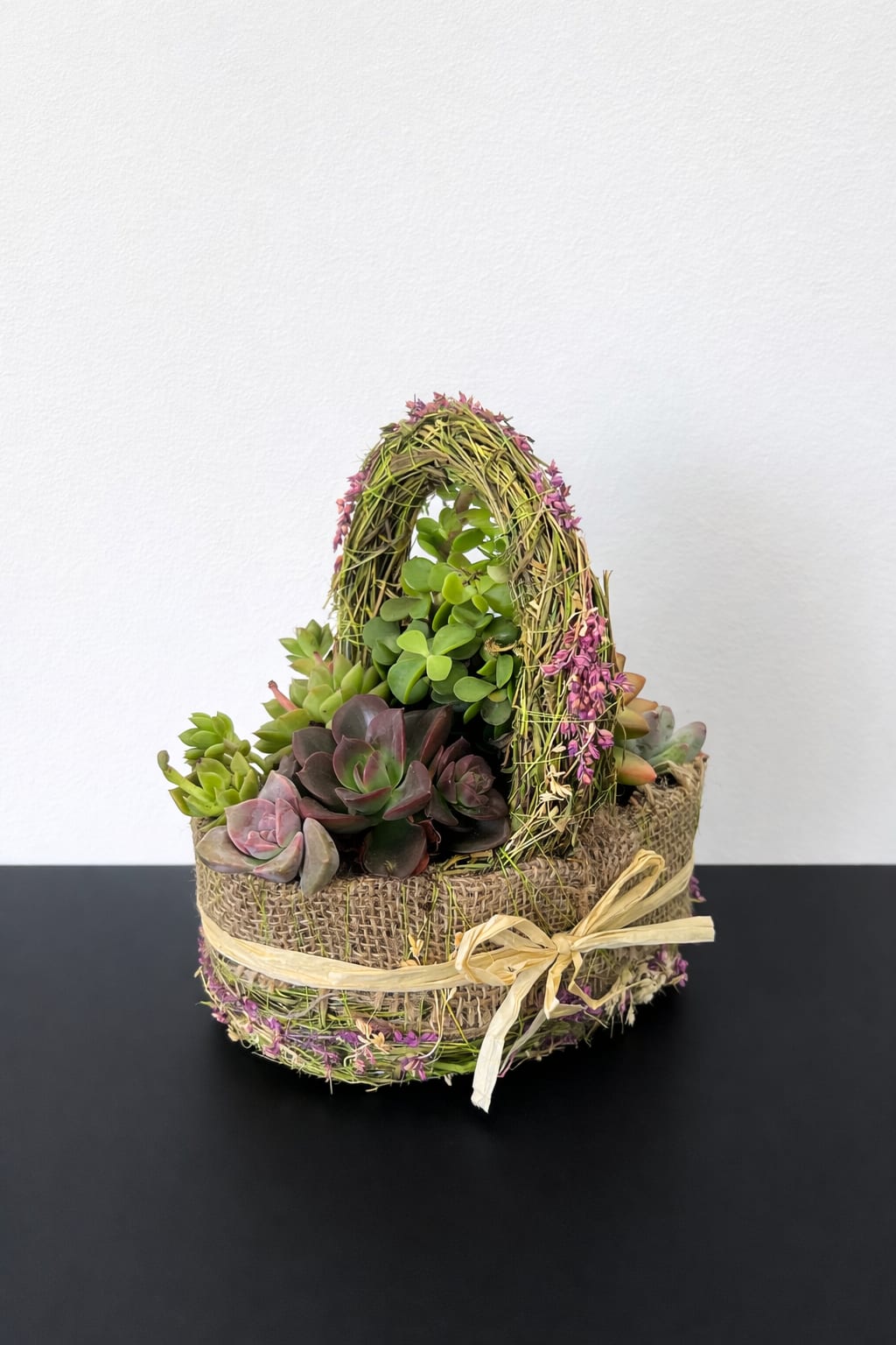Spring Succulent Basket - The sweetest little succulent basket styled in soft burlap with natural moss and delicate accents. Filled with vibrant, easy to care for succulents, it's the perfect long-lasting spring gift for someone special or a delicate touch for your space. 