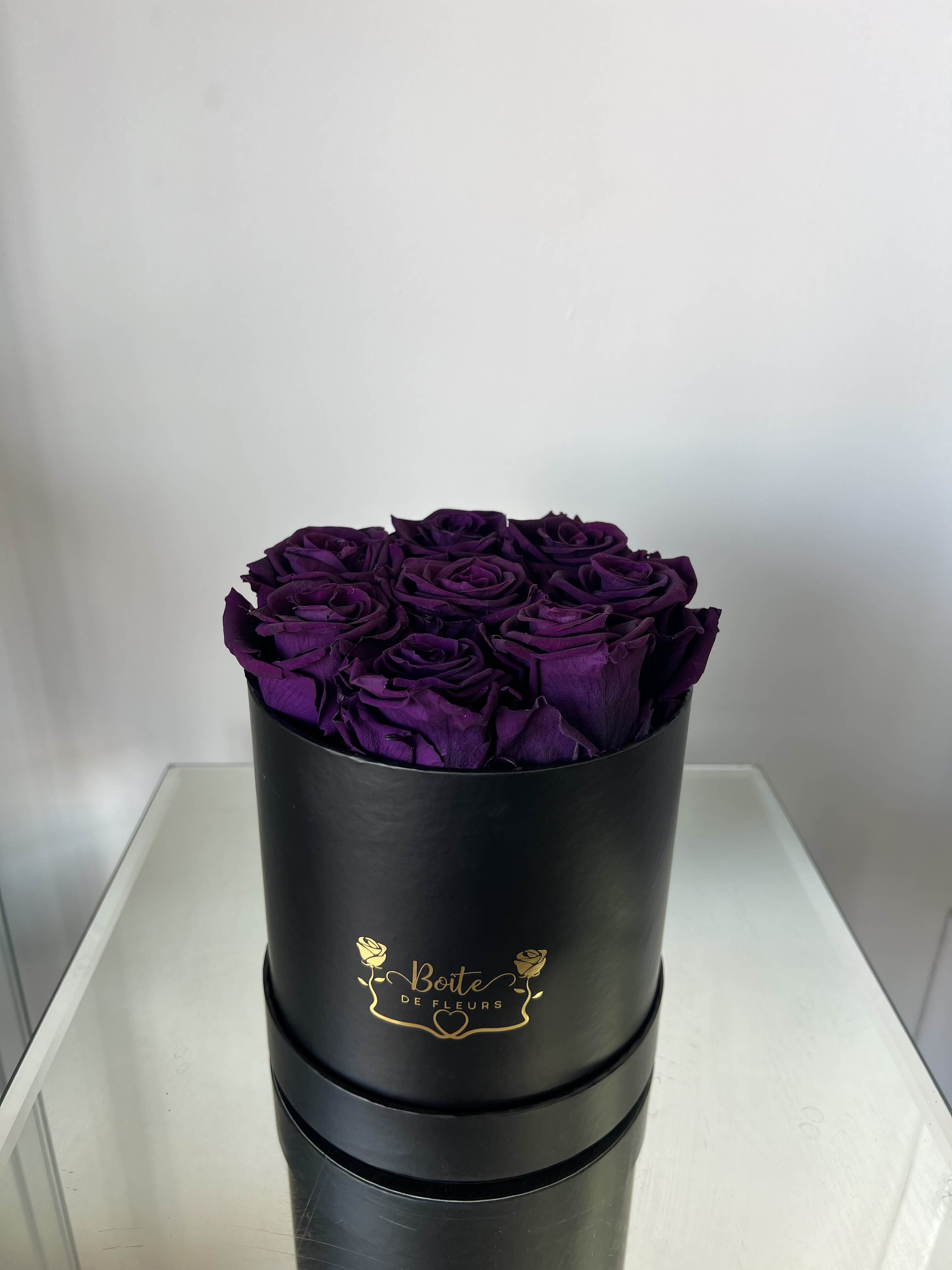 Forever Love (Dark Purple) - Make a bold and unforgettable statement with our Eternal Dark Purple Luxury Boîte, featuring premium long-lasting preserved red roses beautifully arranged in our signature black Boîte de Fleurs box. This arrangement is the perfect gift for anniversaries, Valentine’s Day, birthdays, proposals, or just because.  Each preserved rose is carefully selected and treated to maintain its natural beauty for months (even years) with proper care — no water required. These real roses maintain their soft texture and rich dark purple color, offering a modern alternative to traditional fresh flower arrangements.  Boîte de Fleurs specializes in luxury boxed flower arrangements in Phoenix, Scottsdale, and Paradise Valley. We offer premium flower delivery throughout the Phoenix metro area with beautifully packaged, statement-making designs.  Limited quantities available. Order your preserved red rose arrangement today for local Phoenix flower delivery.