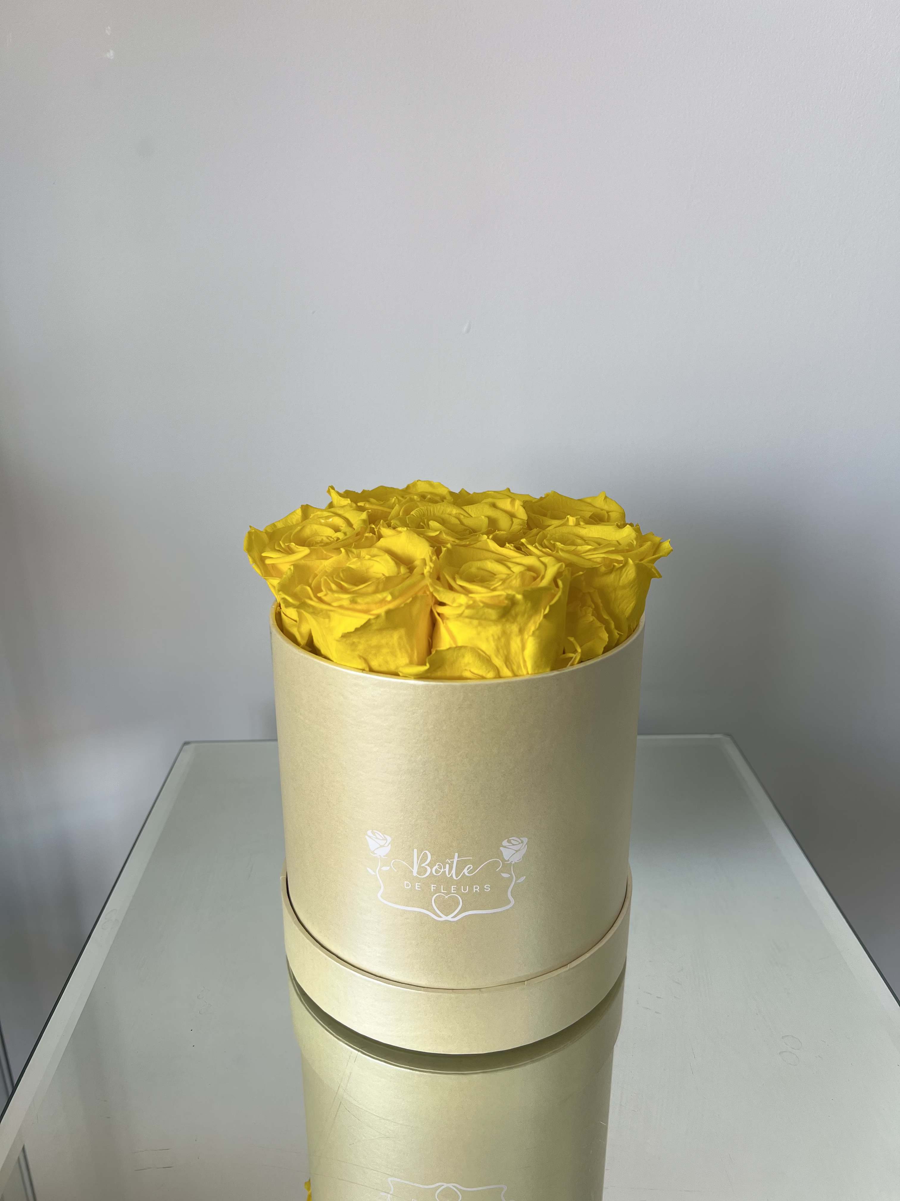Forever Love (Yellow) - Make a bold and unforgettable statement with our Eternal Yellow Luxury Boîte, featuring premium long-lasting preserved red roses beautifully arranged in our signature yellow Boîte de Fleurs box. Designed to symbolize deep love, passion, and elegance, this arrangement is the perfect gift for anniversaries, Valentine’s Day, birthdays, proposals, or just because.  Each preserved rose is carefully selected and treated to maintain its natural beauty for months (even years) with proper care — no water required. These real roses maintain their soft texture and rich yellow color, offering a modern alternative to traditional fresh flower arrangements.  Boîte de Fleurs specializes in luxury boxed flower arrangements in Phoenix, Scottsdale, and Paradise Valley. We offer premium flower delivery throughout the Phoenix metro area with beautifully packaged, statement-making designs.  Limited quantities available. Order your preserved red rose arrangement today for local Phoenix flower delivery.