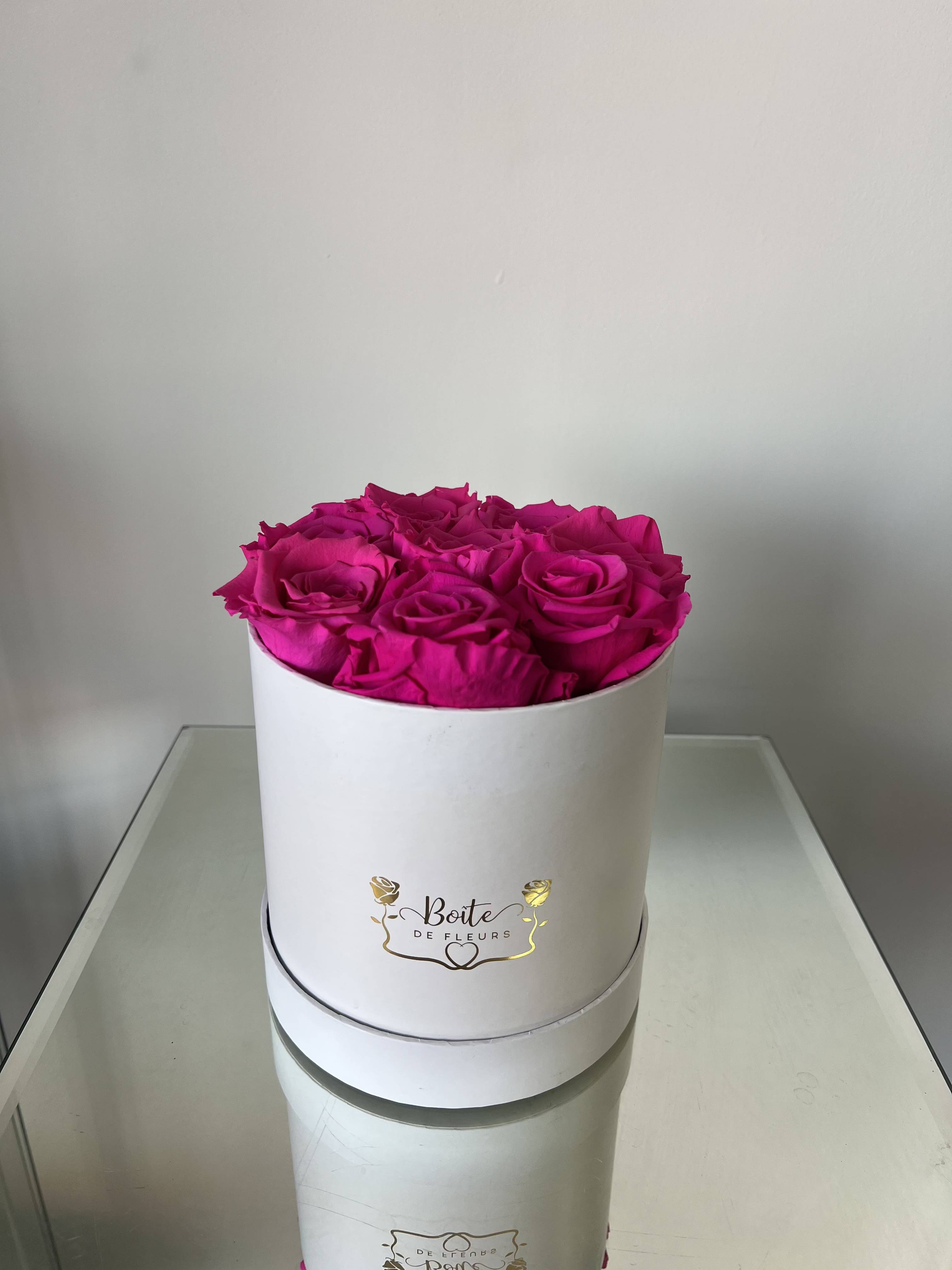 Forever Love (Hot Pink) - Make a bold and unforgettable statement with our Eternal Hot Pink Luxury Boîte, featuring premium long-lasting preserved hot pink roses beautifully arranged in our signature white Boîte de Fleurs box. This arrangement is the perfect gift for anniversaries, Valentine’s Day, birthdays, proposals, or just because.  Each preserved rose is carefully selected and treated to maintain its natural beauty for months (even years) with proper care — no water required. These real roses maintain their soft texture and hot pink color, offering a modern alternative to traditional fresh flower arrangements.  Boîte de Fleurs specializes in luxury boxed flower arrangements in Phoenix, Scottsdale, and Paradise Valley. We offer premium flower delivery throughout the Phoenix metro area with beautifully packaged, statement-making designs.  Limited quantities available. Order your preserved red rose arrangement today for local Phoenix flower delivery.