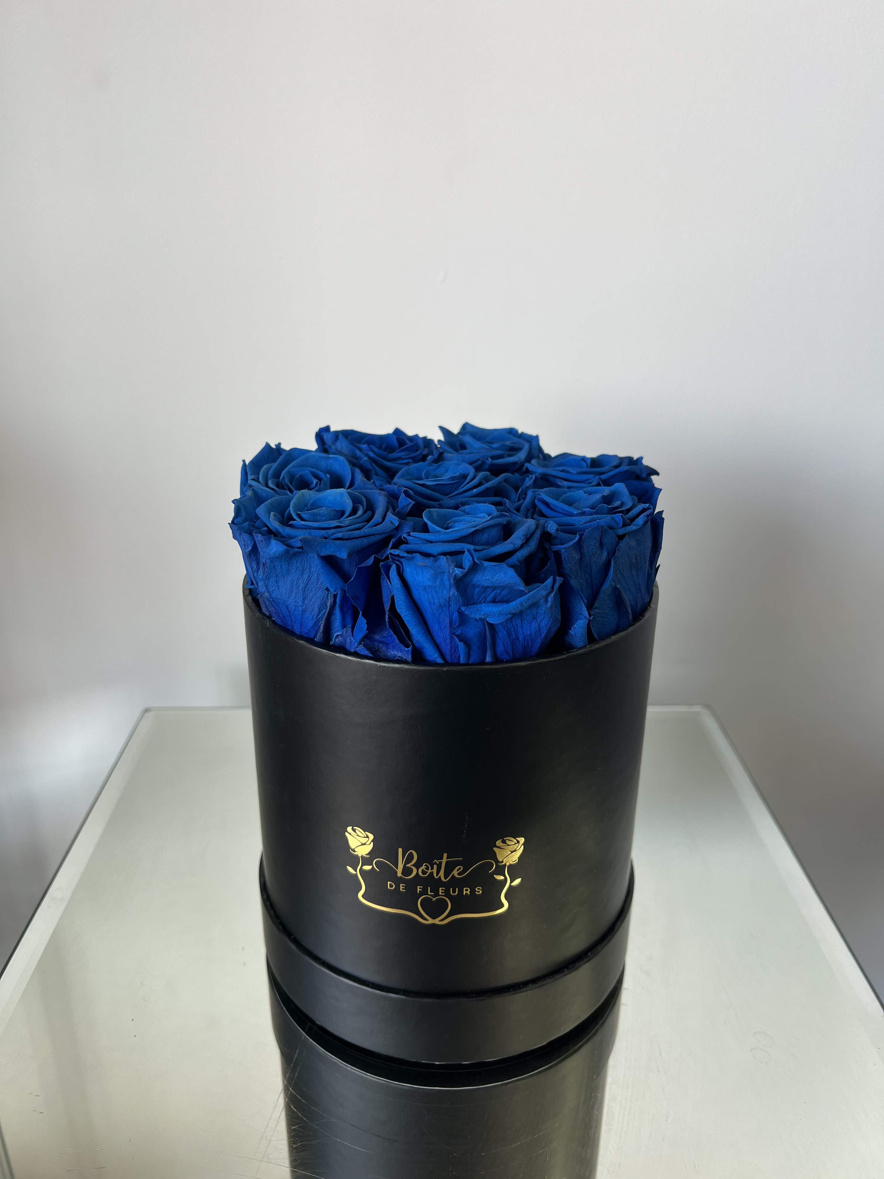 Forever Love (Dark Blue) - Make a bold and unforgettable statement with our Eternal Dark Blue Luxury Boîte, featuring premium long-lasting preserved dark blue roses beautifully arranged in our signature black Boîte de Fleurs box. This arrangement is the perfect gift for anniversaries, Valentine’s Day, birthdays, proposals, or just because.  Each preserved rose is carefully selected and treated to maintain its natural beauty for months (even years) with proper care — no water required. These real roses maintain their soft texture and rich dark blue color, offering a modern alternative to traditional fresh flower arrangements.  Boîte de Fleurs specializes in luxury boxed flower arrangements in Phoenix, Scottsdale, and Paradise Valley. We offer premium flower delivery throughout the Phoenix metro area with beautifully packaged, statement-making designs.  Limited quantities available. Order your preserved red rose arrangement today for local Phoenix flower delivery.