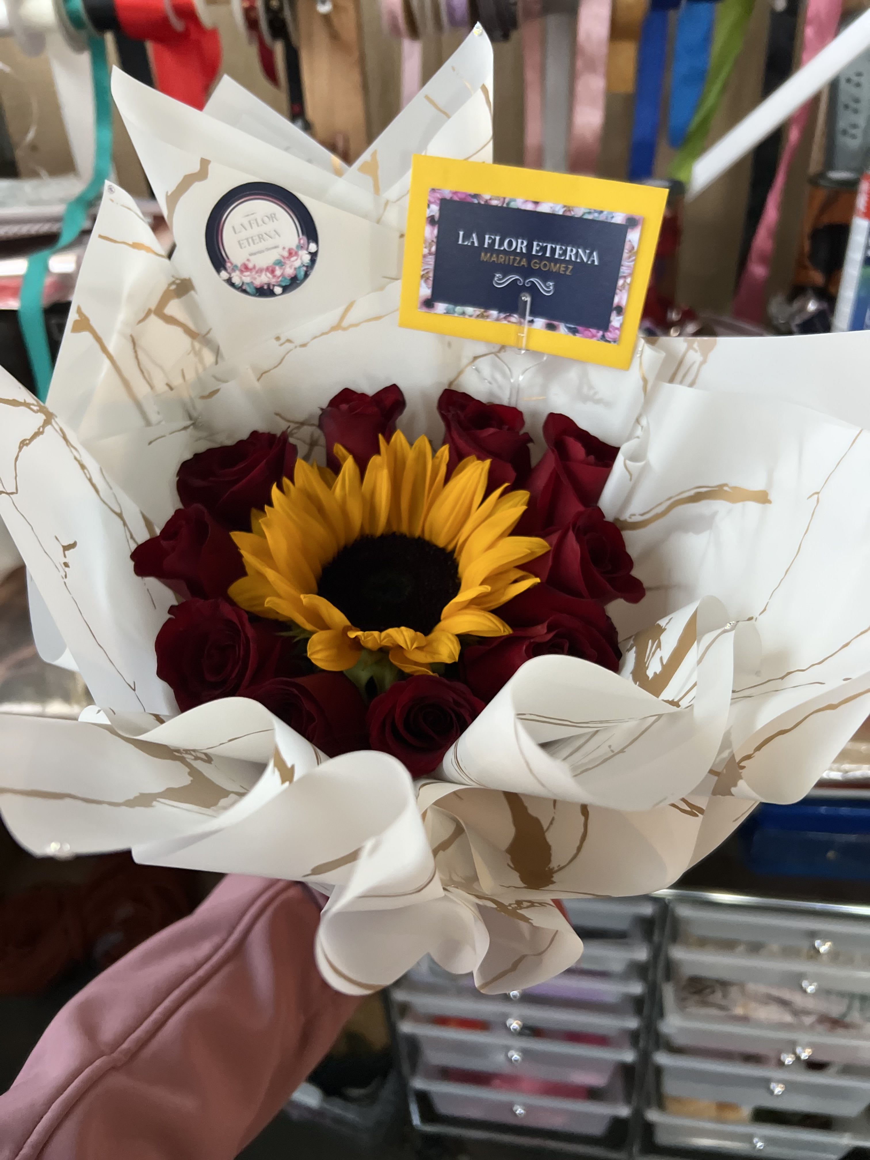 Roses and Sunflower Bouquet - red Roses with sunflower. color paper is designed and chosen by florist 