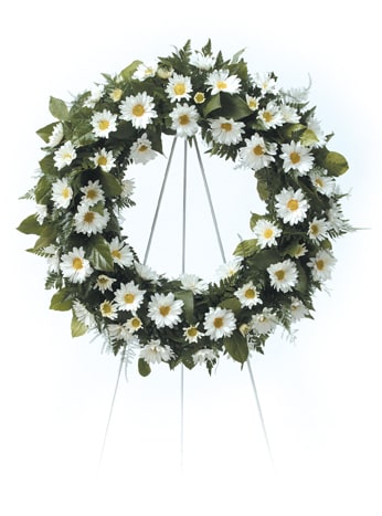 Daisy Wreath - Hignight's Daisy Wreath is approximately 21" in diameter and is displayed on a 48" tall stand. This wreath is available in white, yellow, or lavender, or with all three colors combined. Please contact our shop in East Moline directly if you would like a daisy color other than white. 