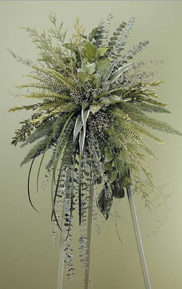 Farewell Foliage Standing Spray - Who knew an arrangement with no blooms could be so striking? Hignight's Farewell Foliage Standing Spray is a lush, overflowing mix of herbs, plant leaves, and exotic foliage from around the world.   Depending on seasonal availabilty, substitutions may be made. Colors, style, and value will remain close to the general style and theme of the original arrangement  Approximately 50"h x 32" w  For Delivery to the following Funeral Homes, Mortuaries, and Crematories in East Moline and other Quad Cities: Van Hoe Funeral Home, Esterdahl Mortuary &amp; Crematory, Sullivan Ellis Mortuary, Schroder Mortuary, Wheelan Pressly Funeral Home, Rafferty Funeral Home, Trimble Funeral Home, DeRoo Funeral Home, Orr Mortuary, Knox Chapel, Wendt Funeral Home, McGinnis Chambers Funeral Home, Cunnick Collins Funeral Home, Runge Mortuary, Weert Funeral Home.
