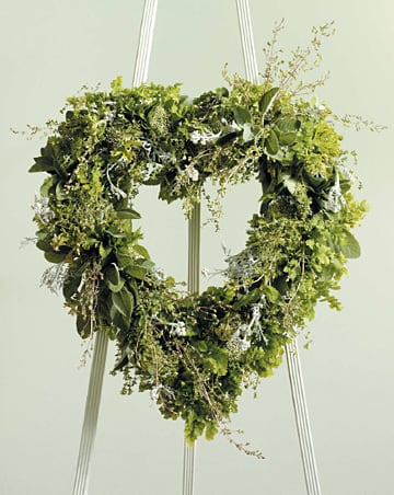 Foliage Heart Standing Spray  -  Our Foliage Heart Standing Spray is a unique modern piece for a truly one-of-a-kind memorial tribute!  Approximately 36"h x 32"w   Depending on seasonal availabilty, substitutions may be made. Colors, style, and value will remain close to the general style and theme of the original arrangement   For Delivery to the following Funeral Homes, Mortuaries, and Crematories in East Moline and other Quad Cities: Van Hoe Funeral Home, Esterdahl Mortuary &amp; Crematory, Sullivan Ellis Mortuary, Schroder Mortuary, Wheelan Pressly Funeral Home, Rafferty Funeral Home, Trimble Funeral Home, DeRoo Funeral Home, Orr Mortuary, Knox Chapel, Wendt Funeral Home, McGinnis Chambers Funeral Home, Cunnick Collins Funeral Home, Runge Mortuary, Weert Funeral Home.  